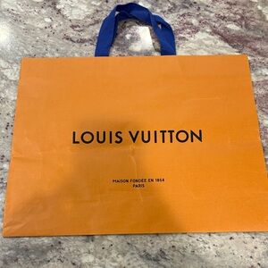 Louis Vuitton Bold Orange Bag with Blue Handles